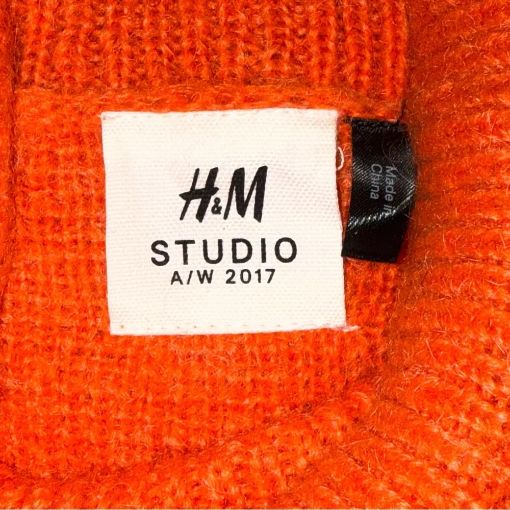 H&M Studio orange turtleneck sweater